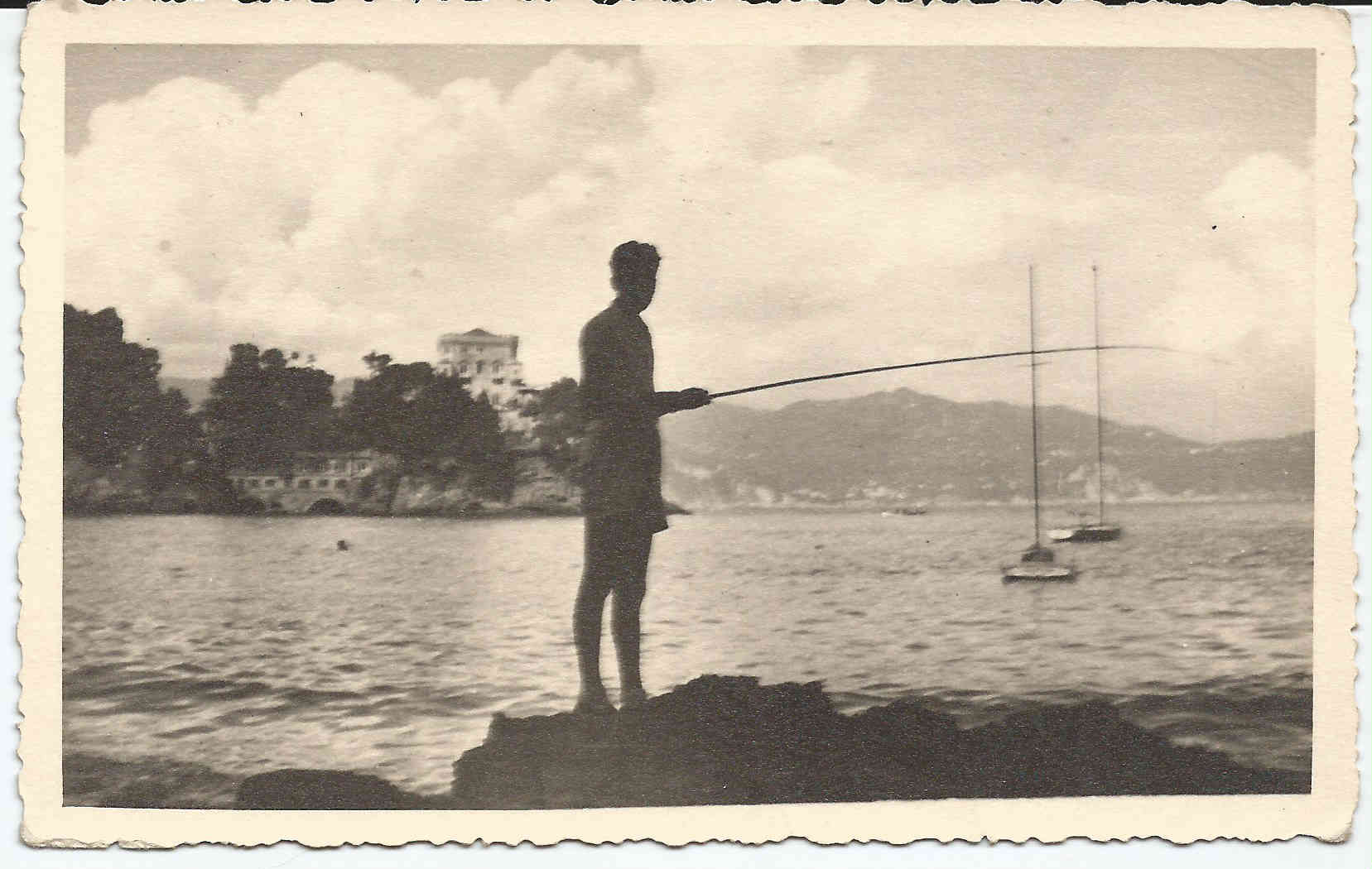 papa pescatore in controluce